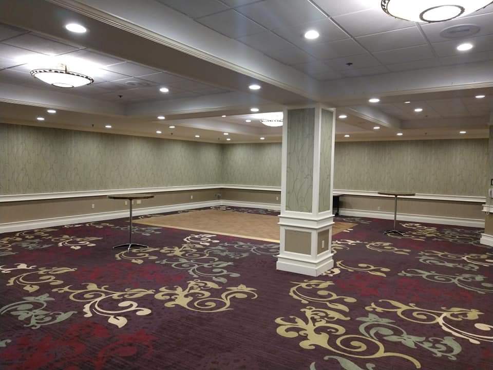 Empty conference room with patterned carpet.